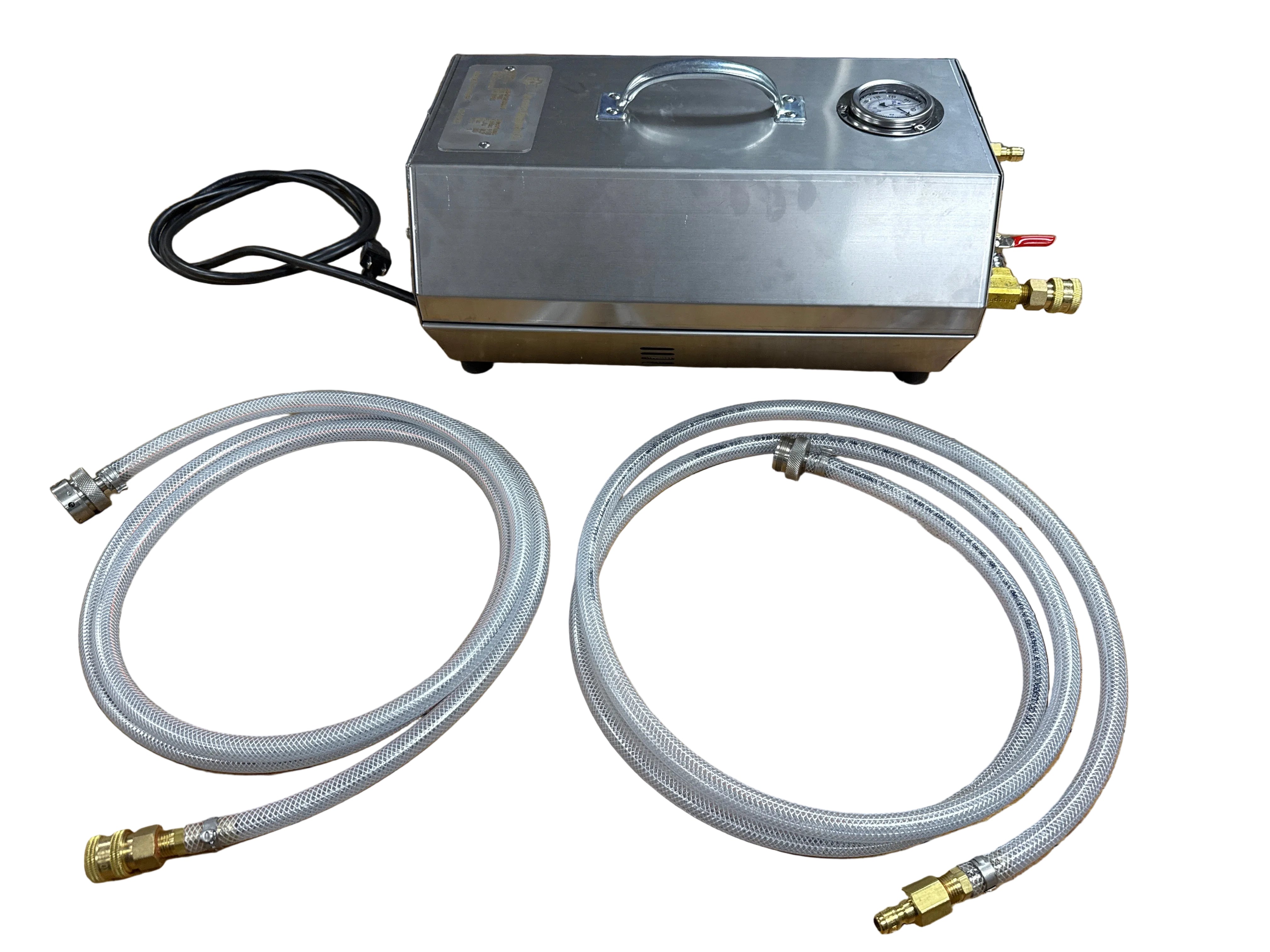 Metal tank with hoses on a wooden surface